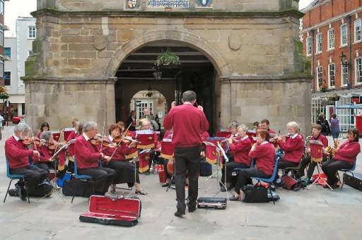 The Orchestra playing in The Square, Shrewsbury
